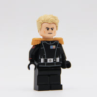 LEGO minifigure with a black outfit and blonde hair on a white background