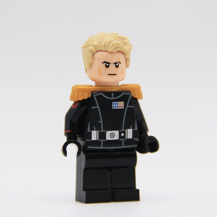 LEGO minifigure with a black outfit and blonde hair on a white background